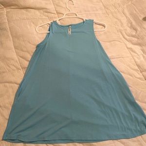 Sleeveless babydoll shape top with POCKETS